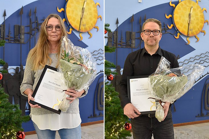 Ann-Sofi och Mikael står med blommor och diplom i händerna.