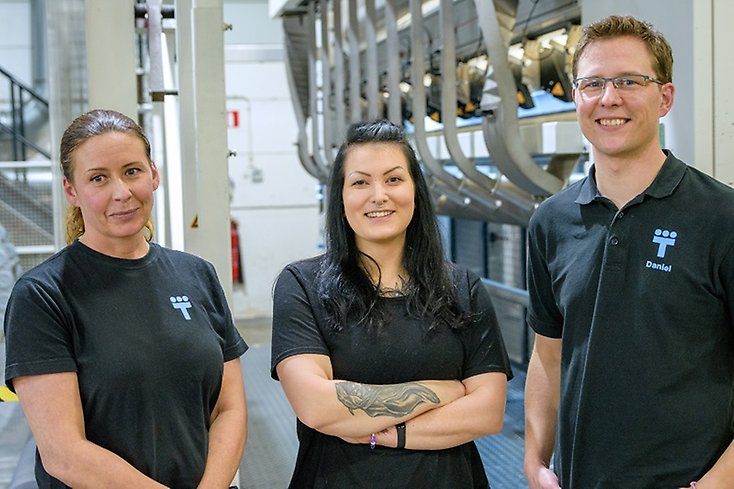 Tre medarbetare från Trioworld i deras lokaler